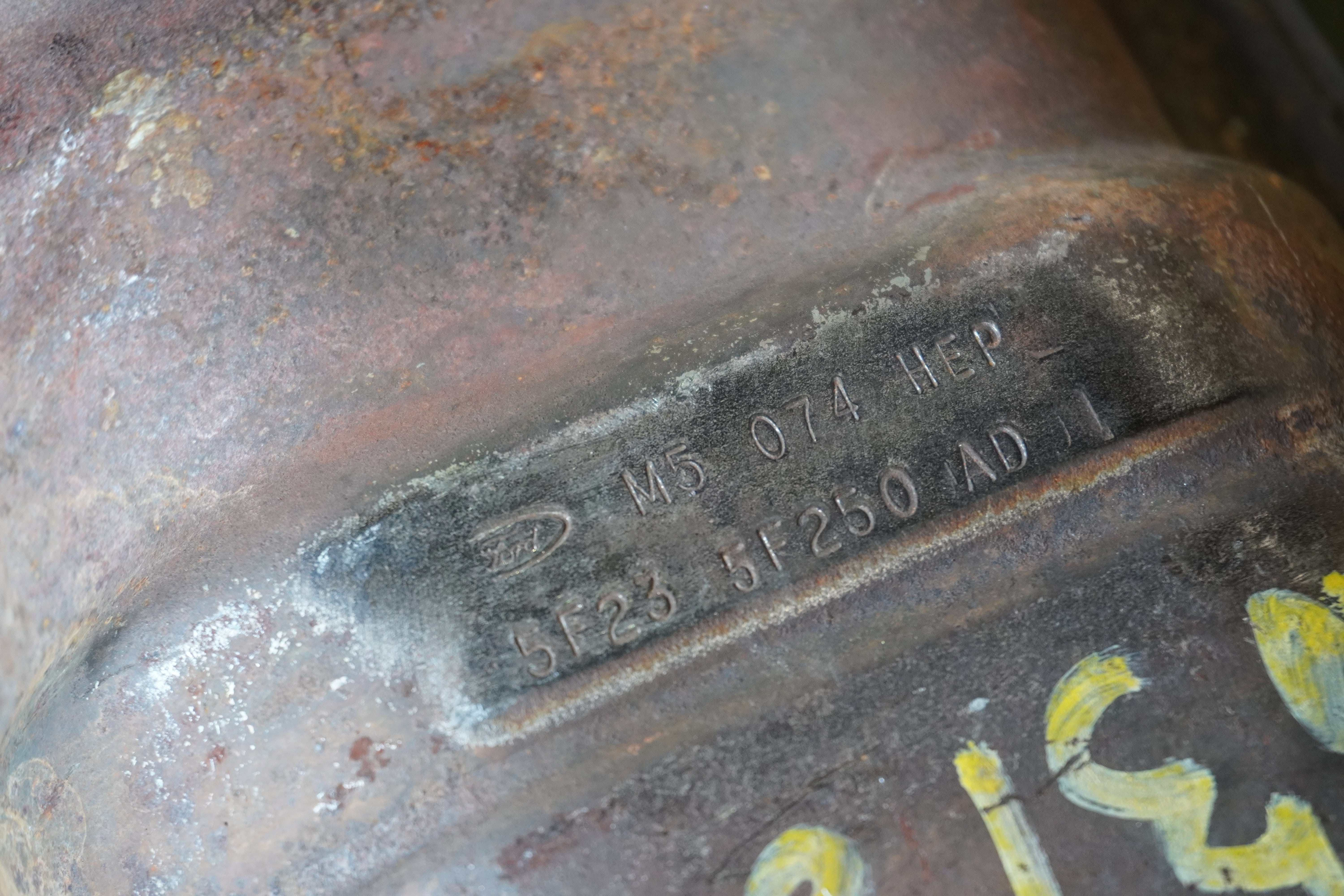 5F235F250 AD serial number for a Ford scrap catalytic converter